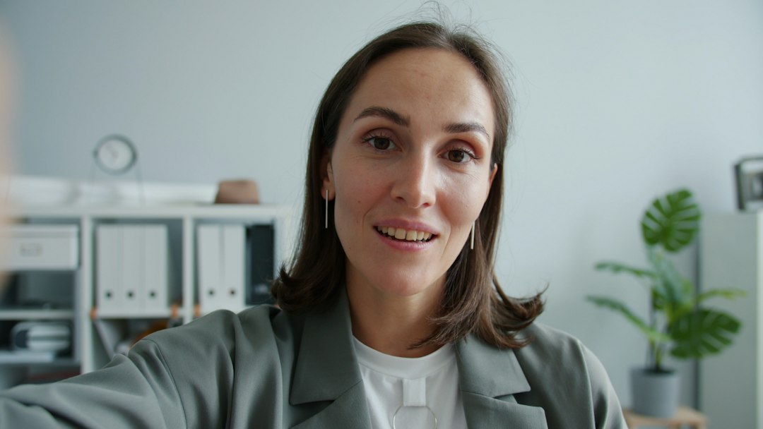 Sales rep on a live video call from her office, the moment real-time coaching applies